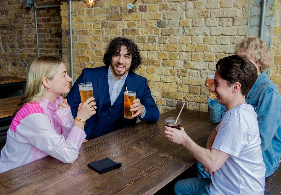No Cants members in conversation at a networking event